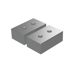 Two metallic vice jaws with holes on a white background